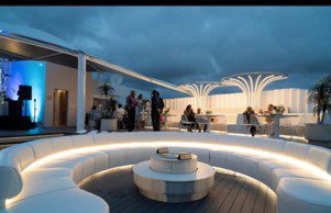 Luxury rooftop entertainment area with bespoke illuminated outdoor furniture by EcoTech Group at The Oceans Residential Development.